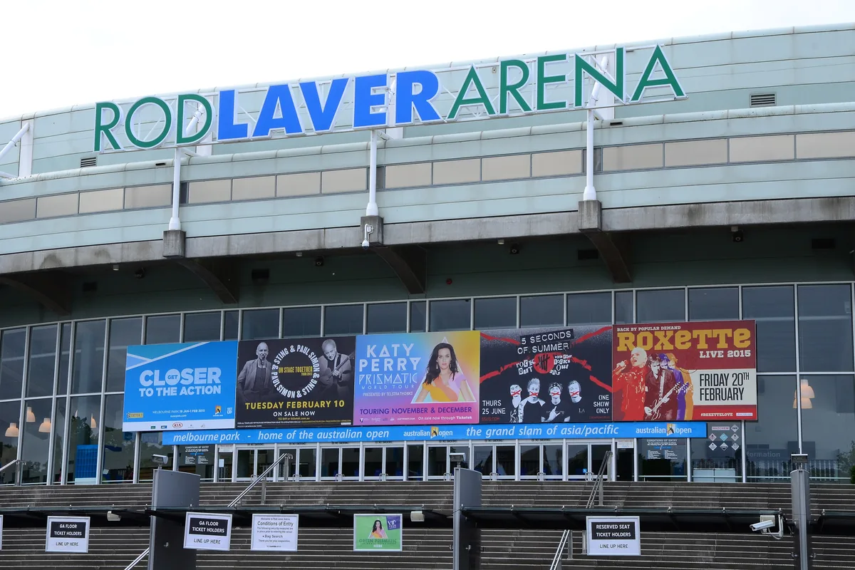 The glass front of Rod Laver Arena with its name in large letters above the entrance.
